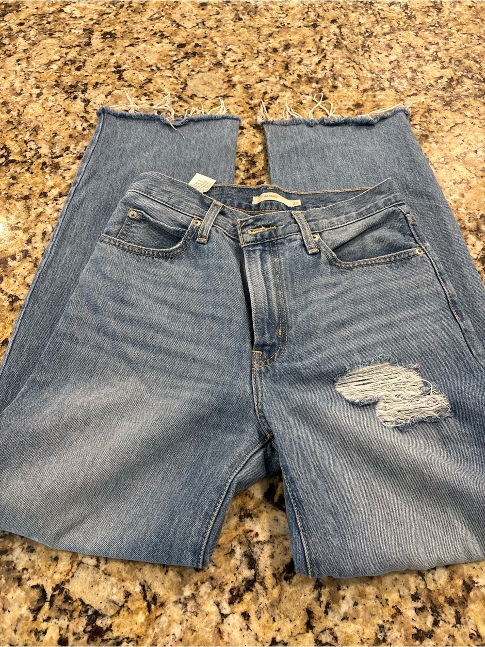 Levi's Medium Light Blue Straight-Leg Jeans with Knee Distress